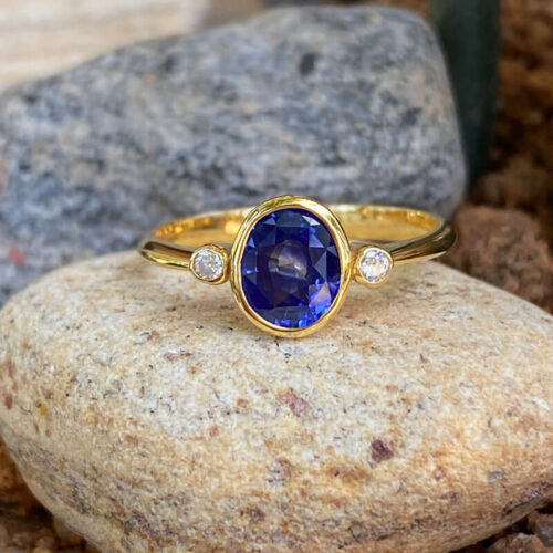 14 kt Yellow Gold Ring Set with Royal Blue Sapphire and Diamonds